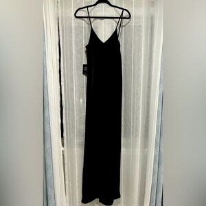 Bias black brand new gown. Thin straps sexy, and elegant